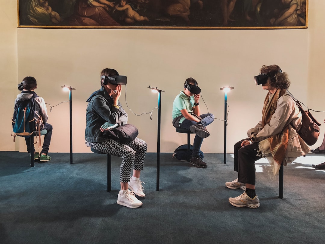 four-person-playing-virtual-reality-goggles-imuwe-p1yqs